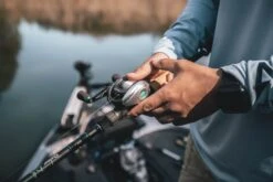 Quantum Energy S3 Baitcasting Reel 16 Quantum Energy S3 Baitcasting Reel -Fishing Sports Shop energy bc reel and rod closeup lifestyle